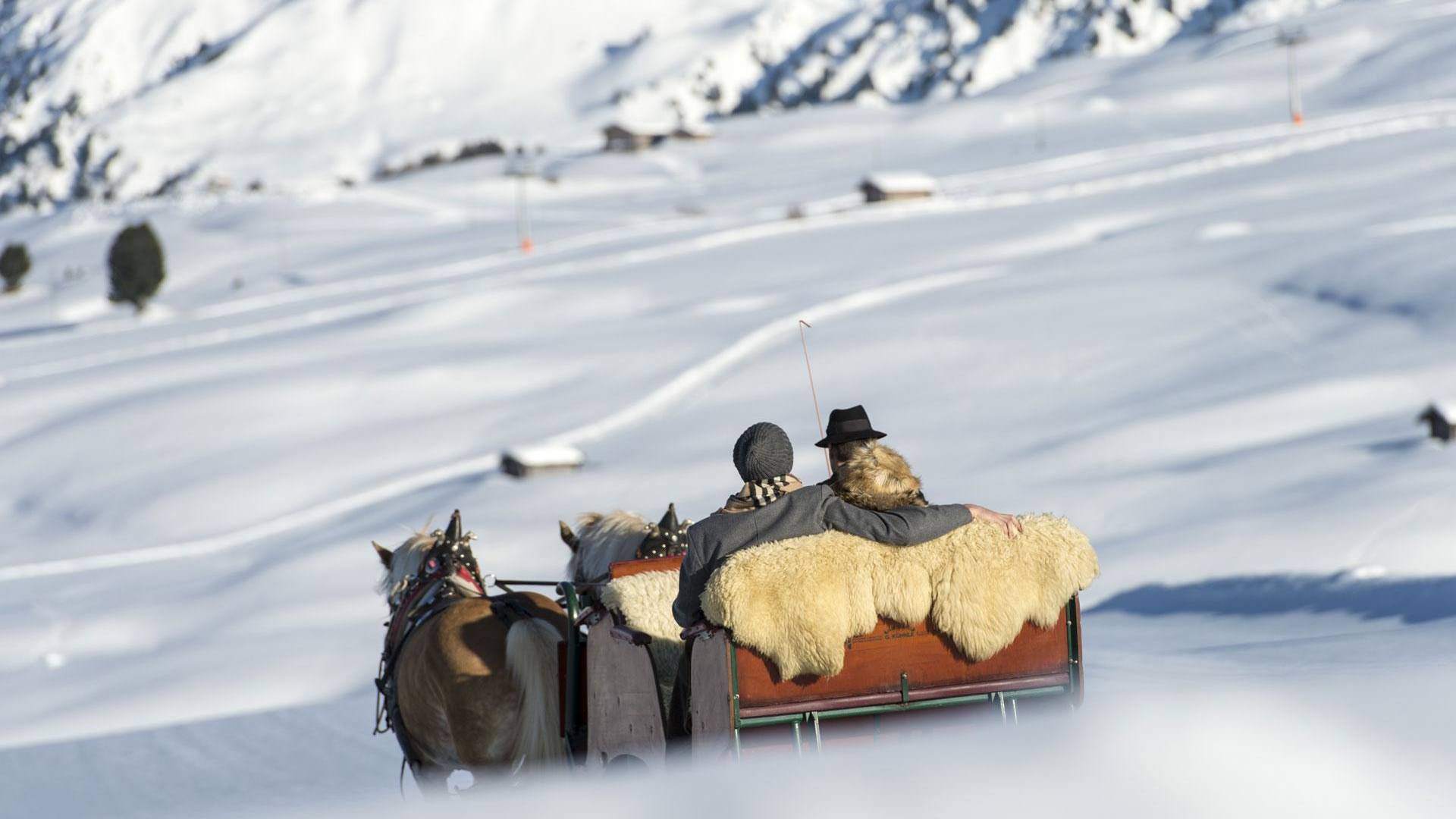 Mit der Kutsche durch den Schnee.